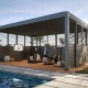 Outdoor gym area with a modern pergola – providing shade and comfort for fitness activities in an open-air environment.