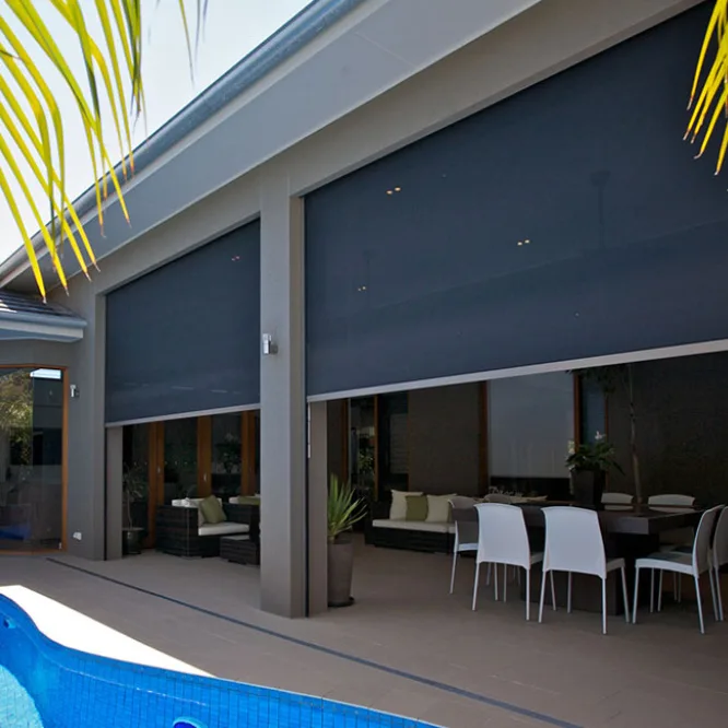 zipblind Motorized Zip Track Zipblind outdoor shade screens over modern home patio dining space
